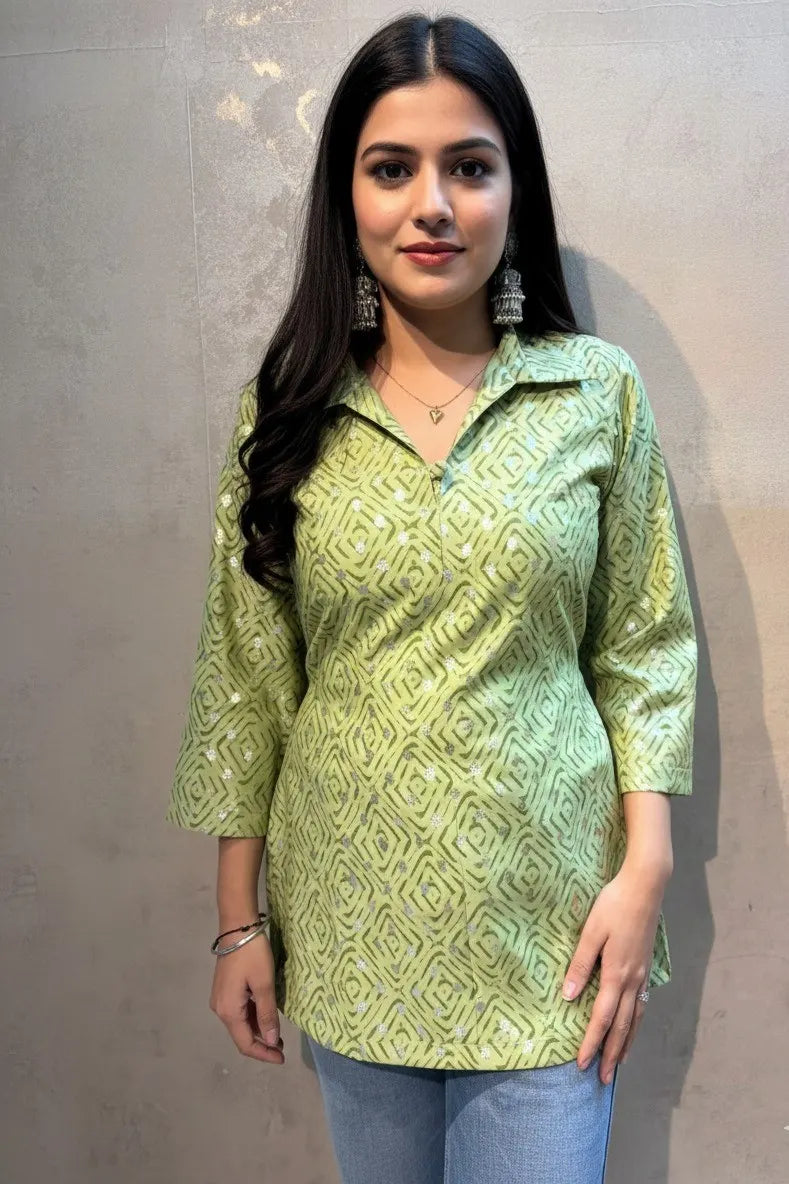 This green cotton kurti for women features a shirt collar, making it a perfect cotton kurti for women for office wear.