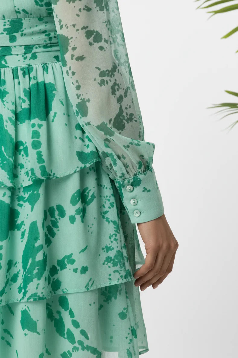 Green floral georgette one piece dress for women with full sleeves and stylish fit. Perfect western outfit, female one piece dress, and trendy short dress for casual wear.