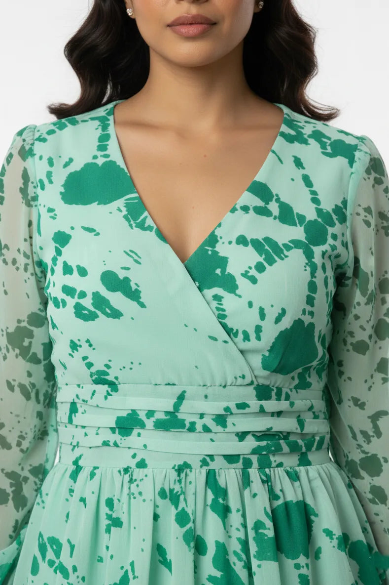 Green floral georgette one piece dress for women with full sleeves and stylish fit. Perfect western outfit, female one piece dress, and trendy short dress for casual wear.