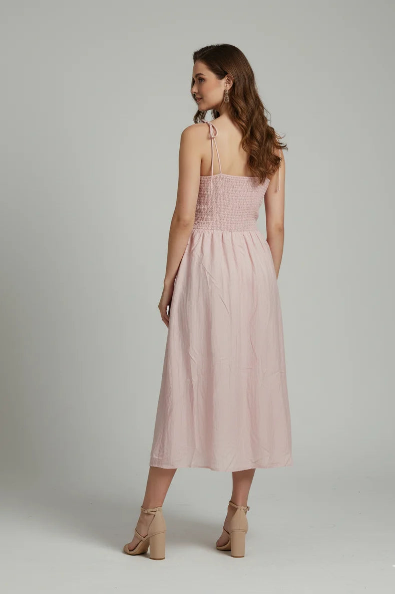 Chic ladies midi dresses featuring a peplum waist and embroidered bodice. The ultimate choice for brunch or garden parties.