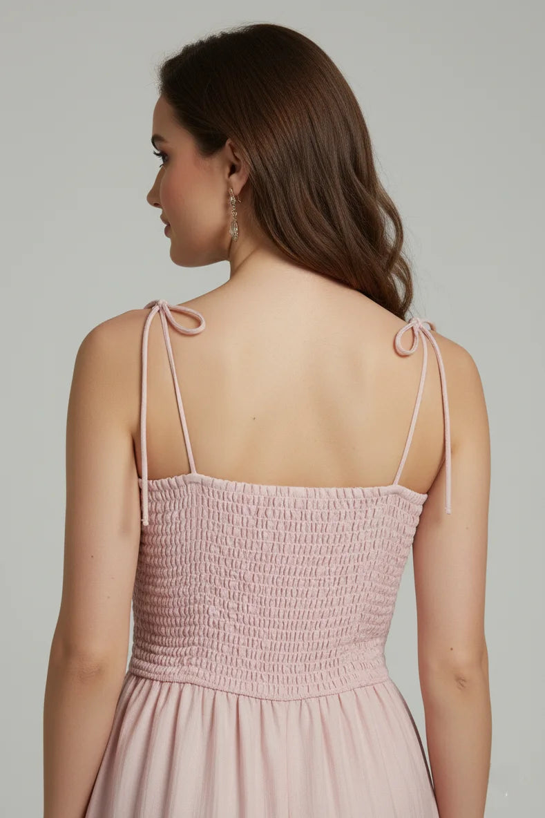 Effortless ladies midi dresses with a peplum waist. Crafted from breathable fabric for a classy feminine style.