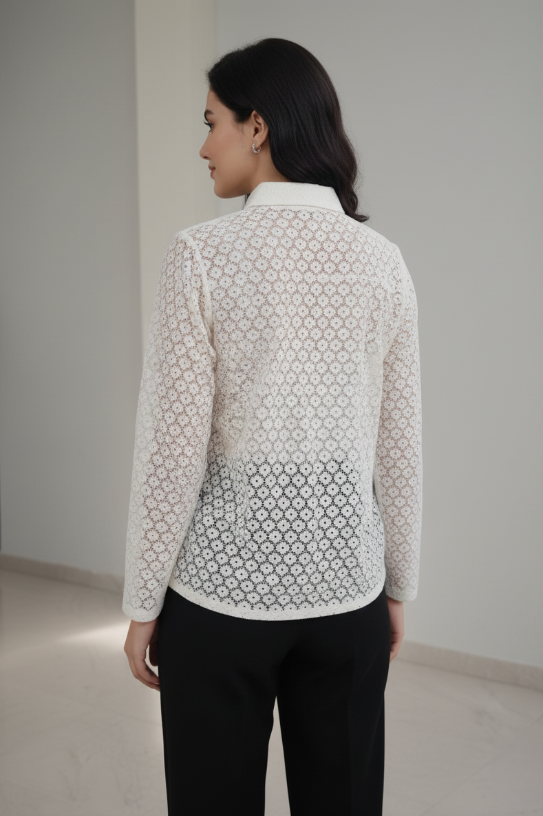 Elevate your wardrobe with this white sheer Korean shirt for women. Its soft, breathable material makes it a standout women’s Korean white sheer shirt for any season.