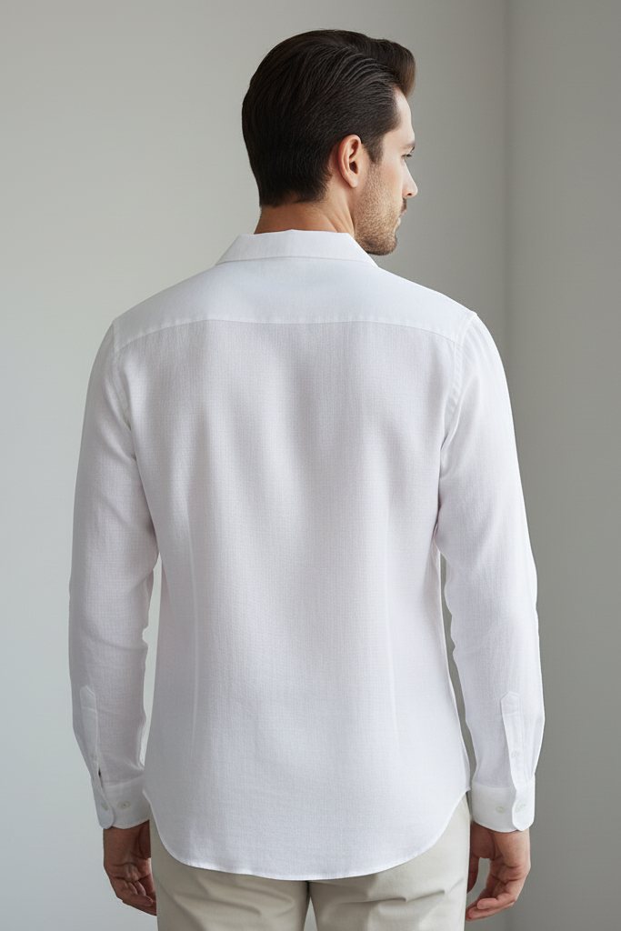 Elevate your summer style with this mens white linen shirt. Crafted with high-quality fabric, this linen mens white shirt is the perfect lightweight option for hot climates.