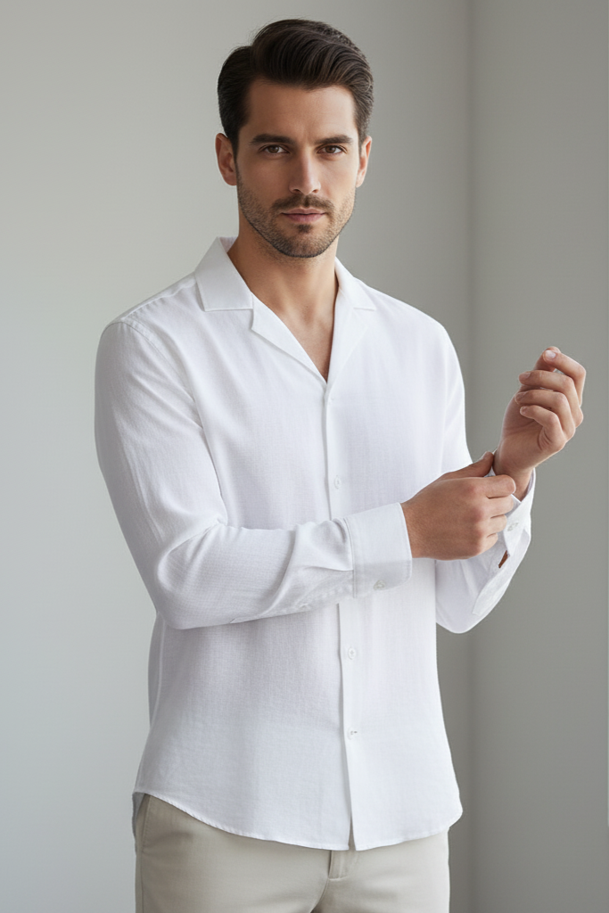 Stay cool and sharp in this men's white linen shirt. Whether for a wedding or a casual day out, this linen mens white shirt offers a relaxed yet polished aesthetic.