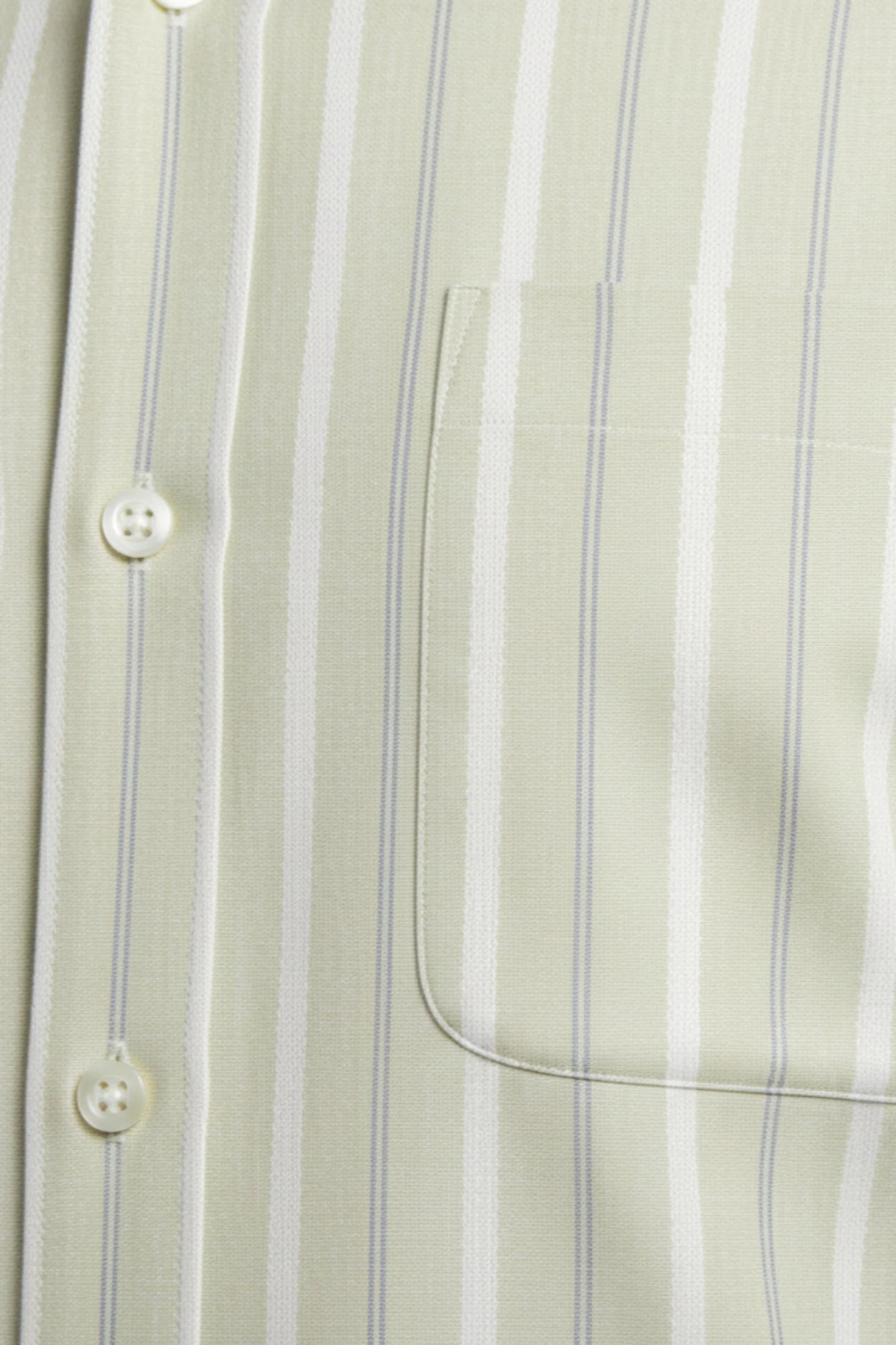 A stylish striped shirt for men in a vibrant shade. This green shirt for men is a versatile shirt for men for any casual outing.