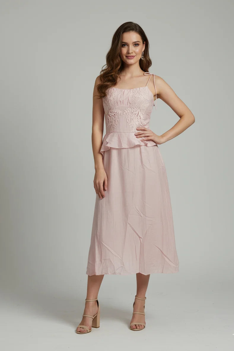 Stylish women midi dress with an embroidered bodice. Combines a premium look with soft, lightweight fabric for all-day comfort.