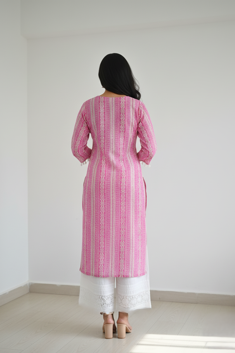 Stay cool and fashionable in this beautiful pink kurti. Crafted from breathable cotton fabric with a modern straight silhouette and vertical stripe print, this kurti for women pairs effortlessly with palazzo pants for a contemporary casual look.