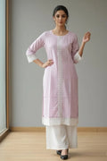 Purple cotton kurta palazzo set for women with full sleeves and round neck design. Perfect summer kurti, short kurta with palazzo, and comfortable daily wear outfit.