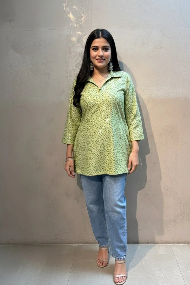 A stylish short kurti for women cotton with a geometric print. This green kurti is ideal for casual outings and daily wear.