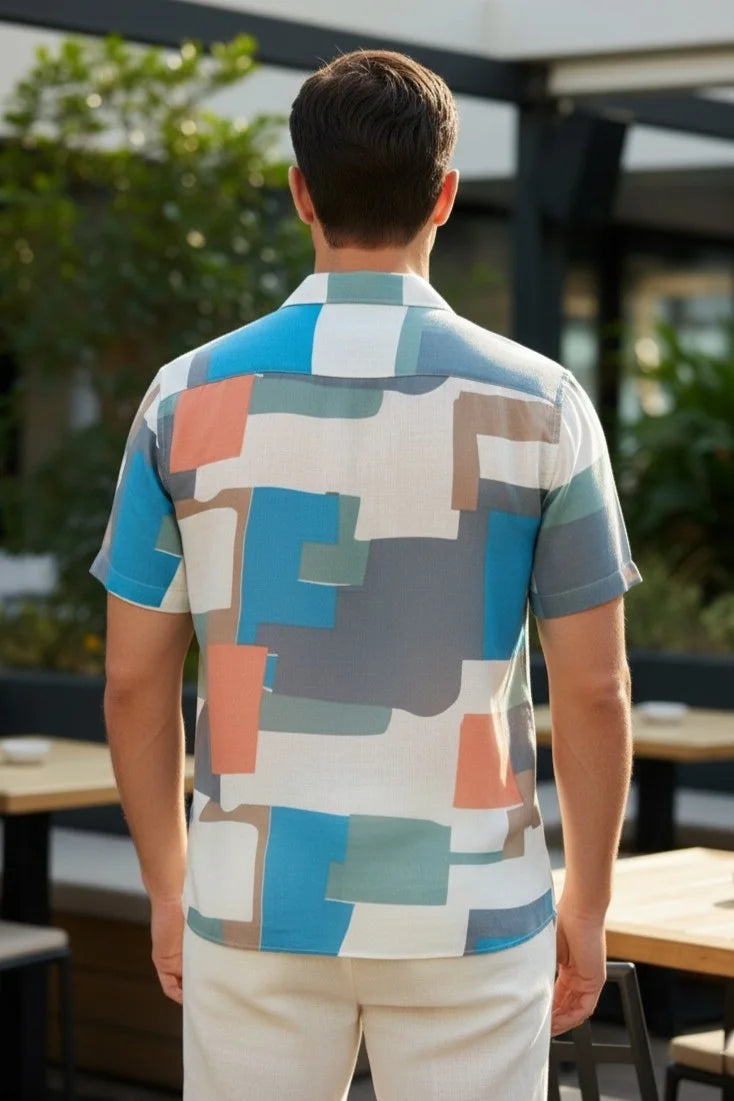 Stay cool in this breathable cotton shirt for men. Perfect for warm weather, these are essential summer shirts for men for any outing.