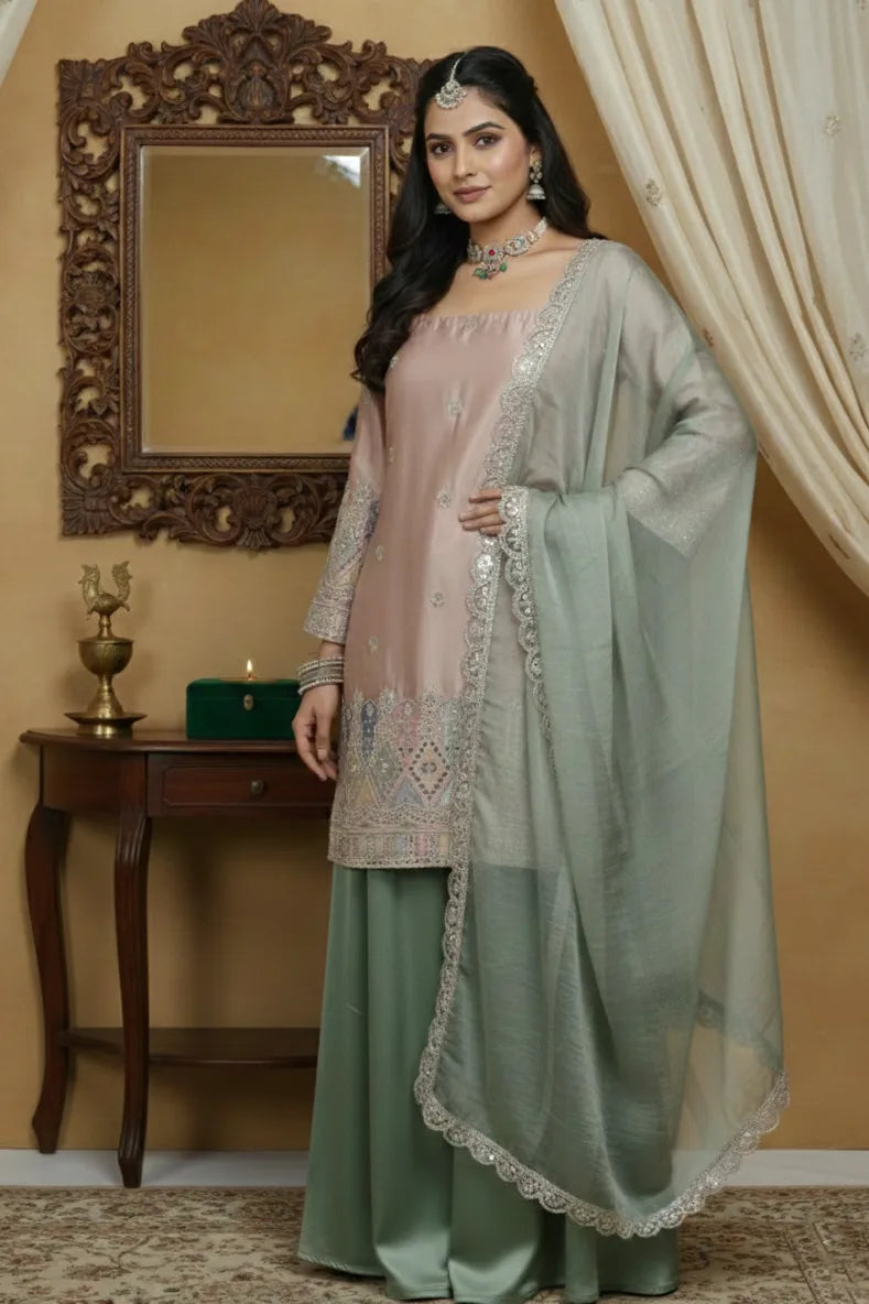 Elegant women silk kurta palazzo set designed as premium ethnic wear, featuring stylish kurtis for women with a comfortable salwar suit for women look. This graceful ethnic dress blends the charm of ethnic dresses for women, inspired by lehengas for women, styled as a kurti pant set with dupatta, perfect for festive and party occasions.