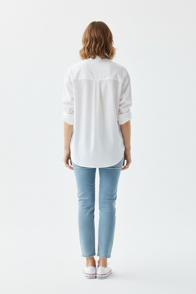 Stylish white loose fit cotton shirt for women, perfect for casual wear, office looks, and everyday comfort.