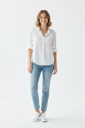 Stylish white loose fit cotton shirt for women, perfect for casual wear, office looks, and everyday comfort.