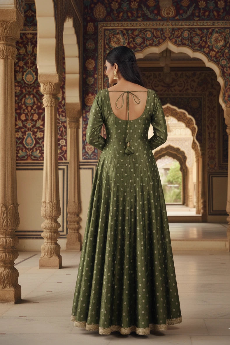 Elegant ethnic wear featuring a flowing anarkali gown with a graceful anarkali silhouette. This stylish gown is suitable for maternity dresses, offers the comfort of maxi dresses, and stands out among timeless gowns for women.
