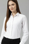 Women’s white cotton shirt featuring a classic spread collar and full sleeves, perfect for formal wear and party wear, elegant white party wear shirt suitable for office and casual styling, premium white formal shirt for women.