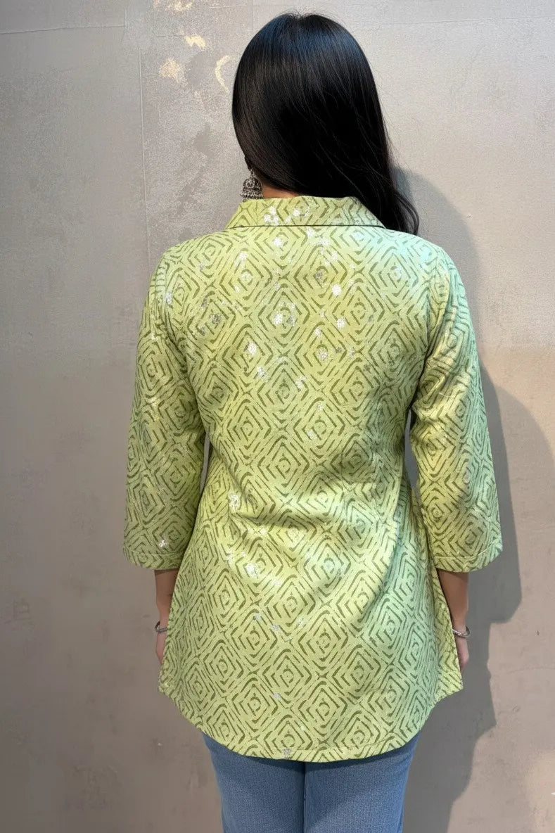 Upgrade your look with this green cotton kurti for women. A modern cotton kurti for women featuring a sleek shirt-style collar.