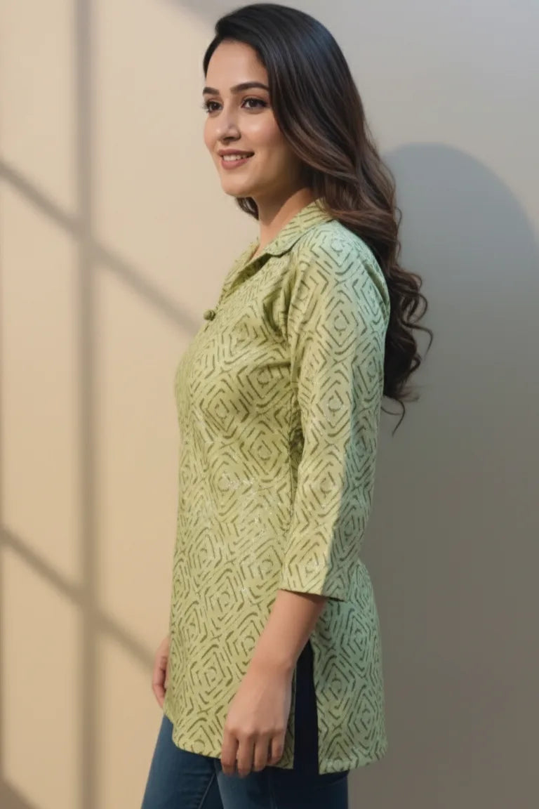 Upgrade your look with this green cotton kurti for women. A modern cotton kurti for women featuring a sleek shirt-style collar.