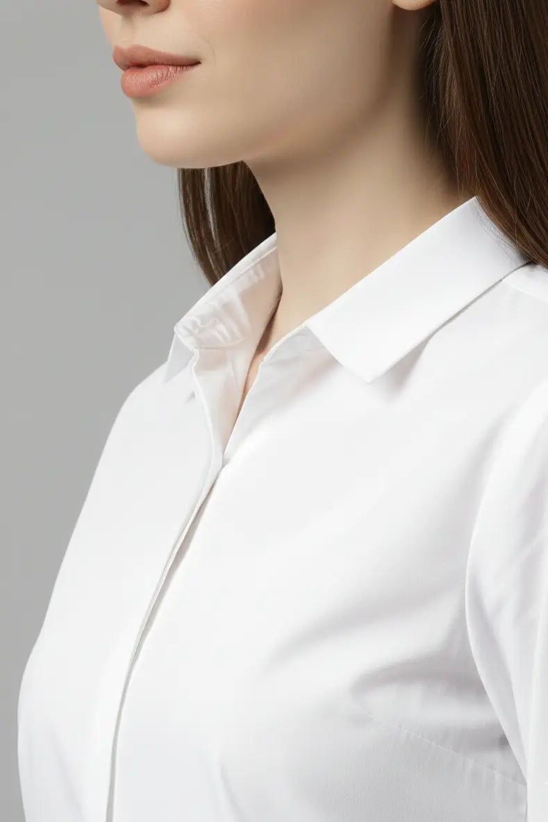 Women’s white cotton shirt featuring a classic spread collar and full sleeves, perfect for formal wear and party wear, elegant white party wear shirt suitable for office and casual styling, premium white formal shirt for women.