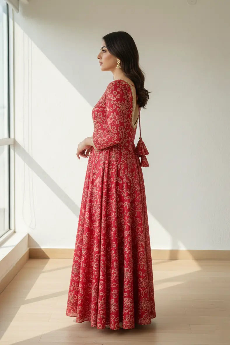 Elegant ethnic wear featuring a flowing anarkali gown with a graceful anarkali silhouette. This stylish gown is suitable for maternity dresses, offers the comfort of maxi dresses, and stands out among timeless gowns for women. side