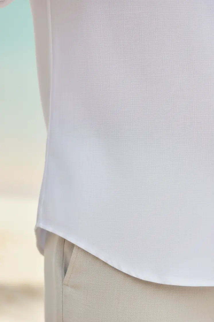 Elegant white linen mandarin collar shirt crafted from premium fabric, designed as a stylish linen mandarin collar shirt for men. This refined linen shirt with mandarin collar blends comfort and class, making it a perfect linen formal shirt and a timeless chinese collar linen shirt for modern wardrobes.