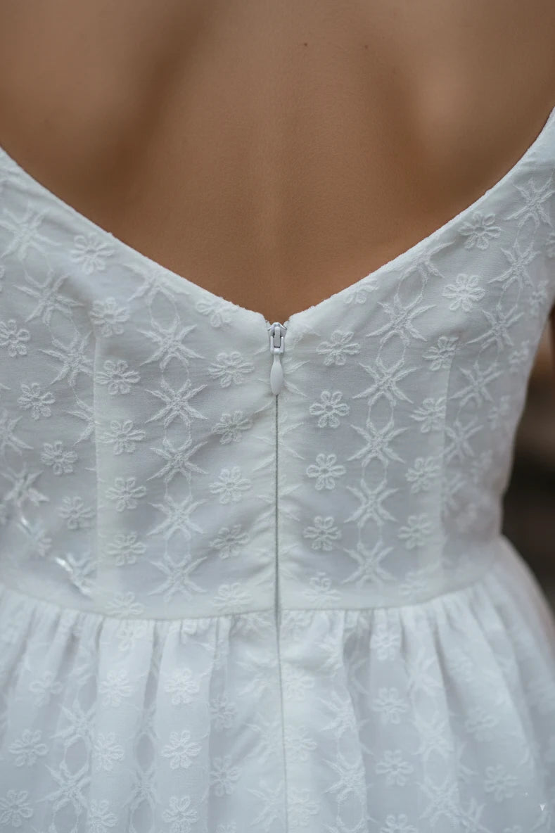 A stylish white top for women featuring a white tank top design, this white sleeveless top is one of the most versatile ladies white tops, crafted as a women cotton top in a trendy women short top style.- back zoom