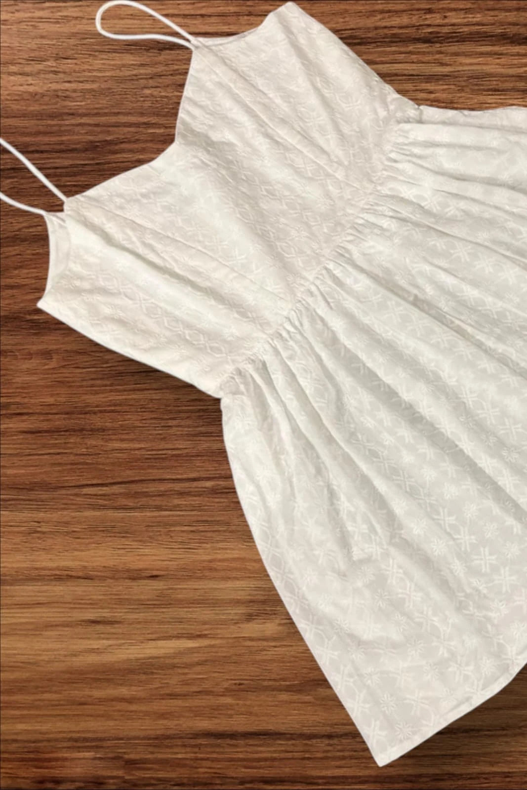 A stylish white top for women featuring a white tank top design, this white sleeveless top is one of the most versatile ladies white tops, crafted as a women cotton top in a trendy women short top style. - real 