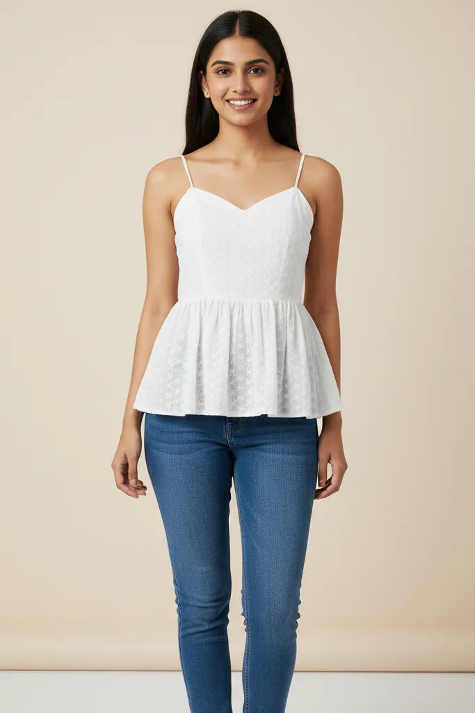 A stylish white top for women featuring a white tank top design, this white sleeveless top is one of the most versatile ladies white tops, crafted as a women cotton top in a trendy women short top style.- front full